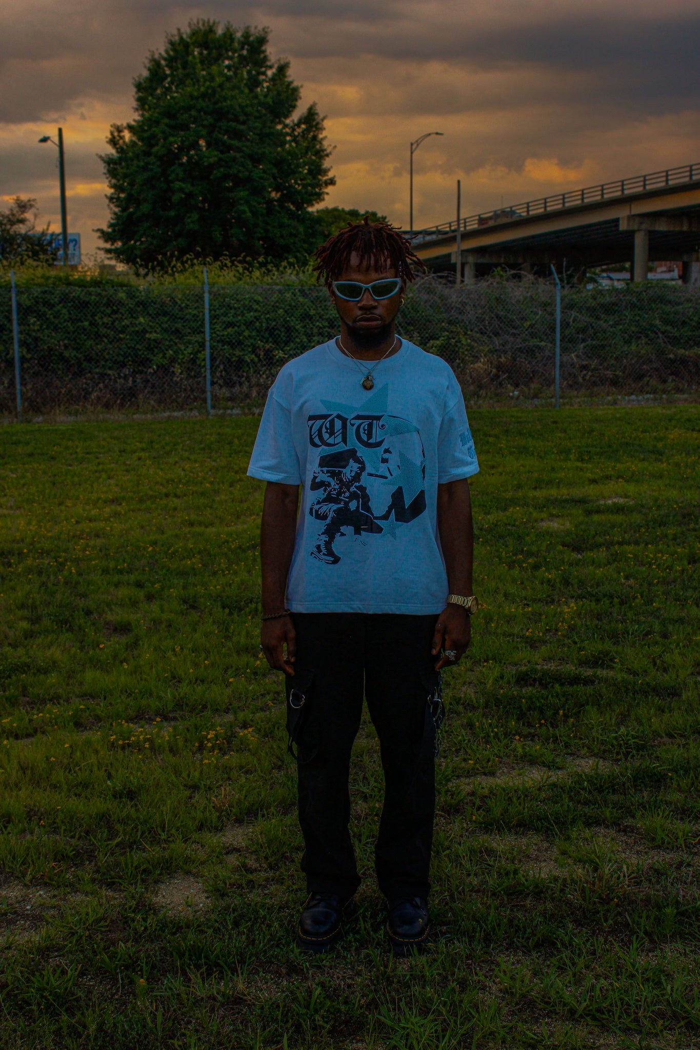 Light Blue "Global Assassin" Rhinestone Tee
