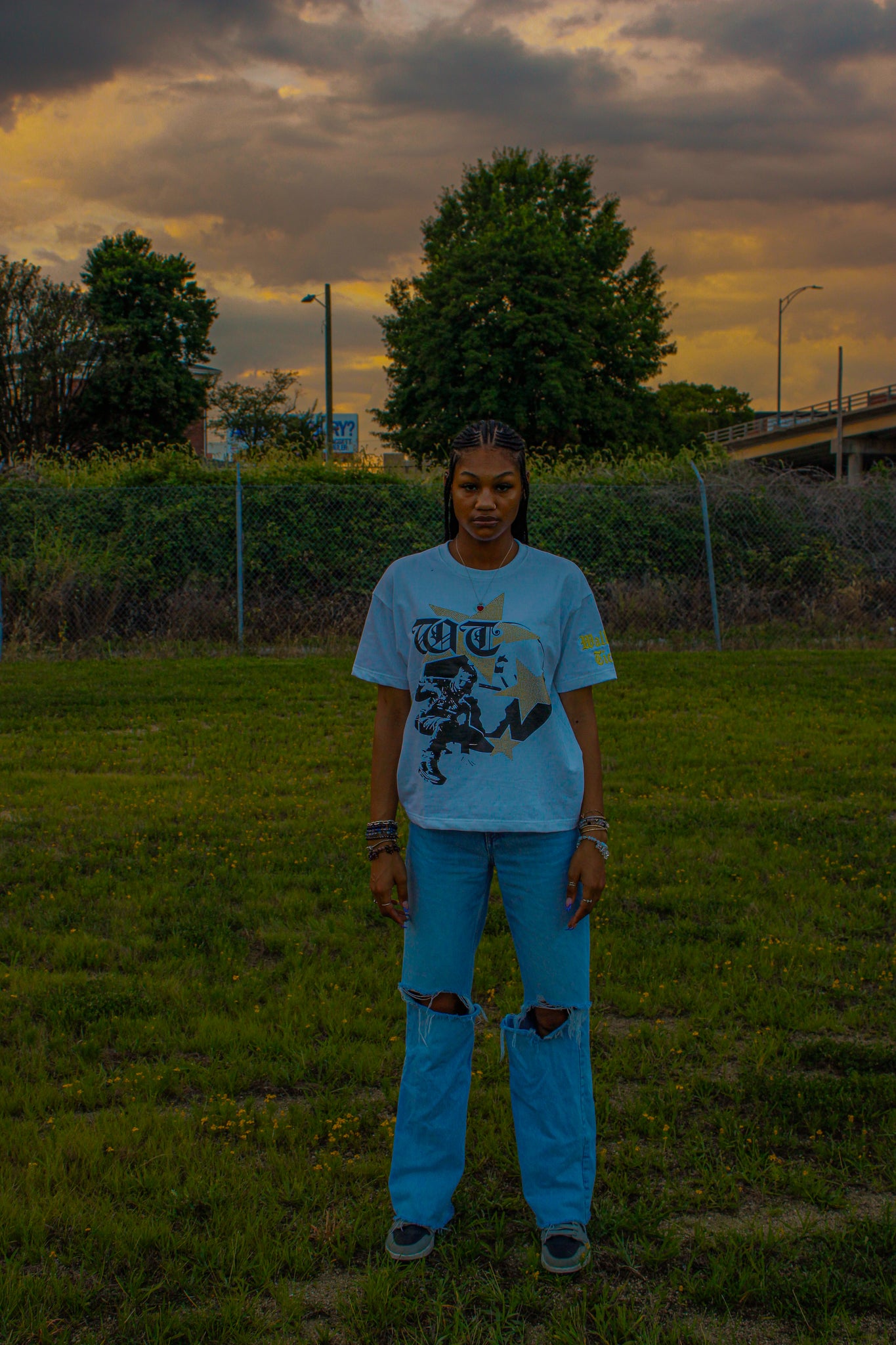 Yellow "Global Assassin" Rhinestone Tee