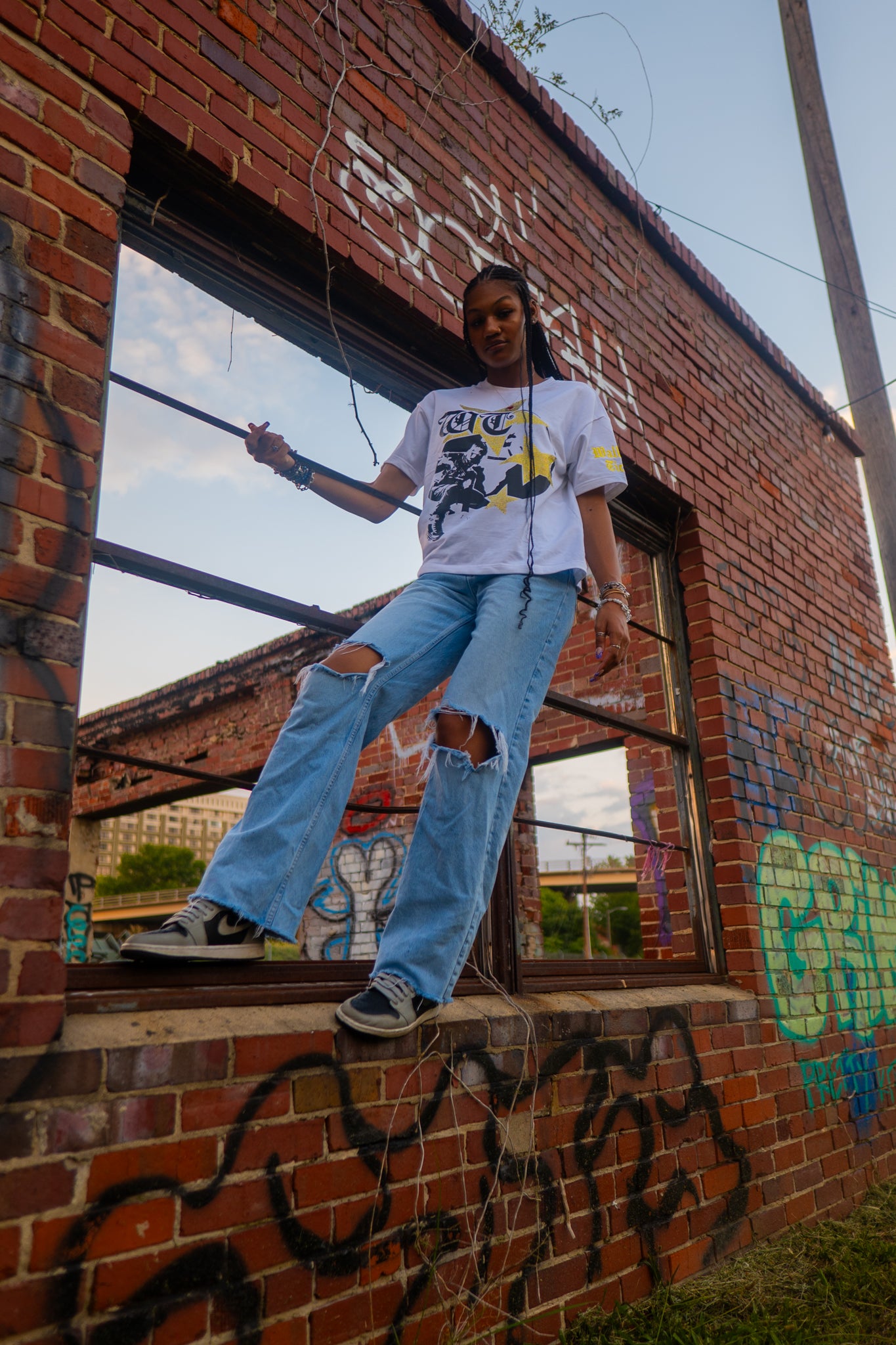 Yellow "Global Assassin" Rhinestone Tee