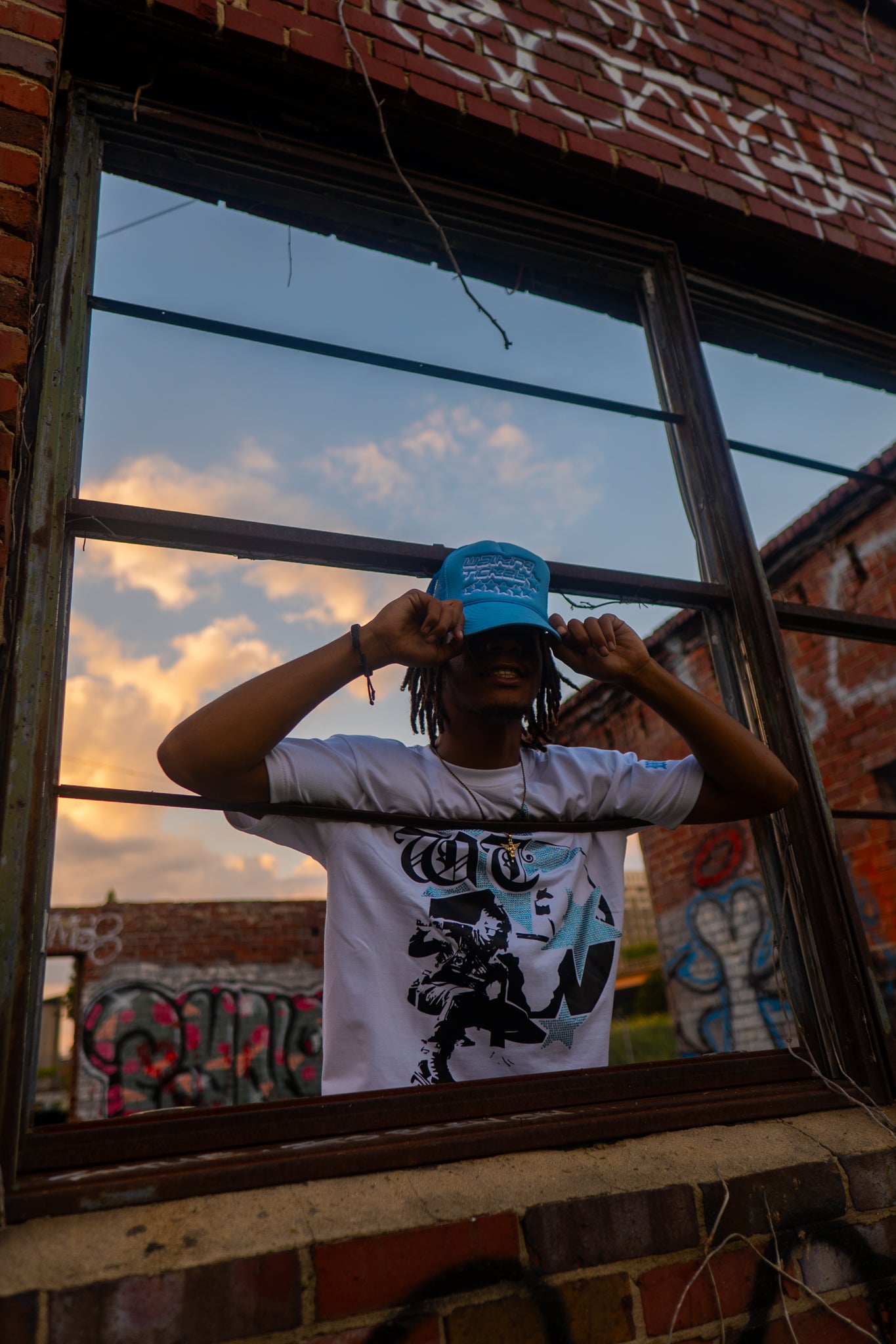 Light Blue "Global Assassin" Rhinestone Tee