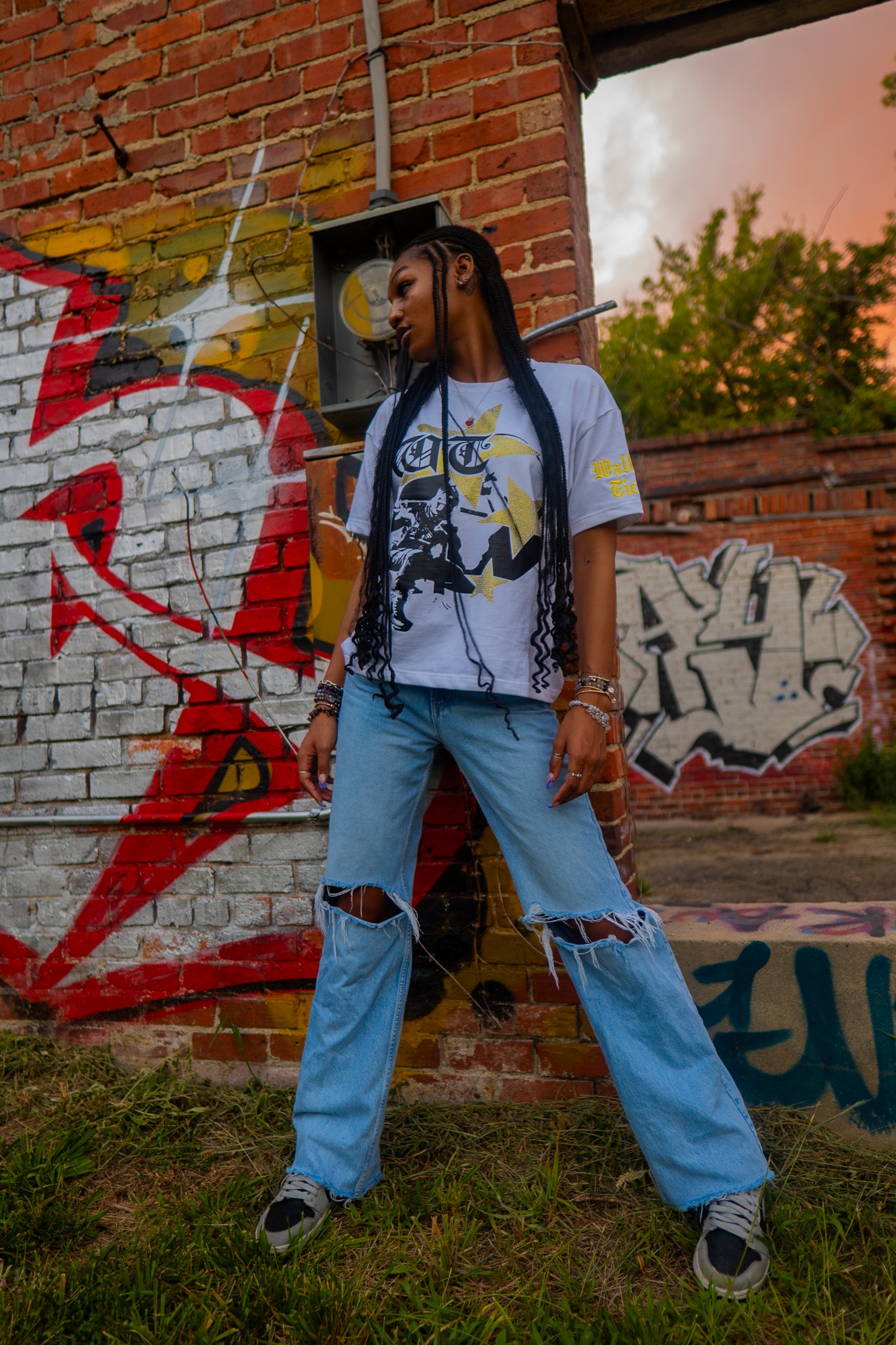 Yellow "Global Assassin" Rhinestone Tee