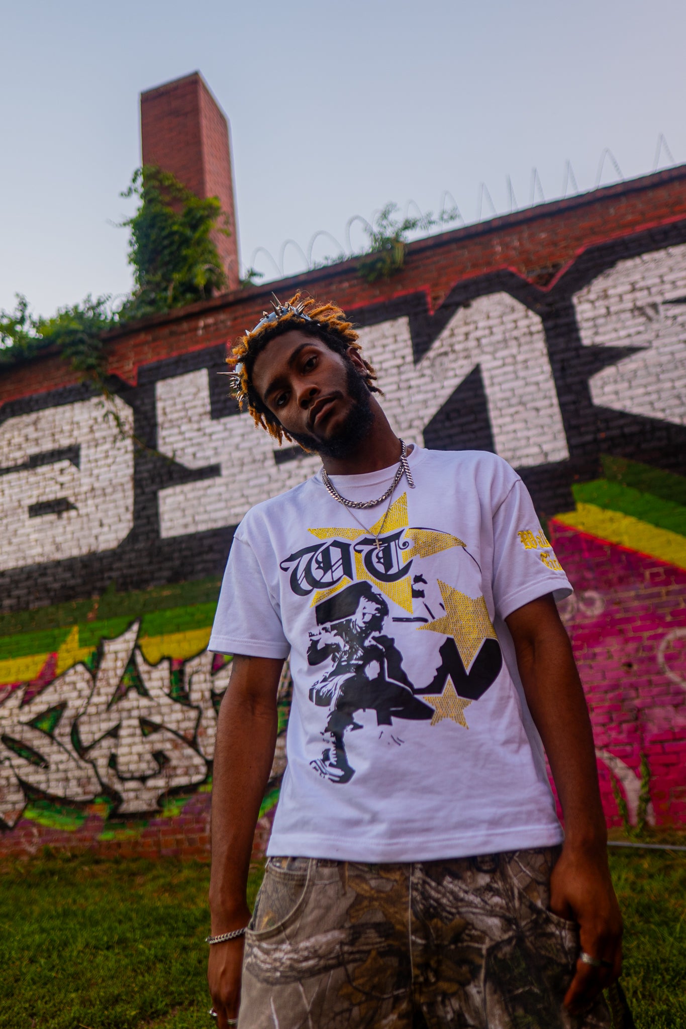Yellow "Global Assassin" Rhinestone Tee
